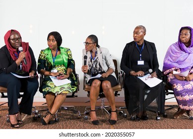 A Group Of Business Women Participating In A Panel Discussion 