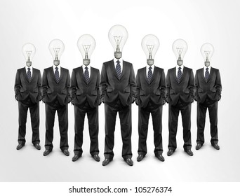 Group Of Businessmen With A Lightbulb In  Head