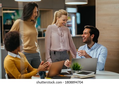 Group of businesspeople having productive office break at cafe - Shutterstock ID 1808894704