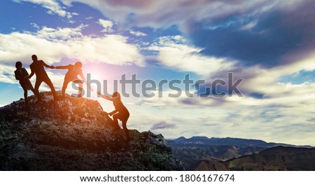 Group of businessperson climbing a mountain. Challenge of business concept.