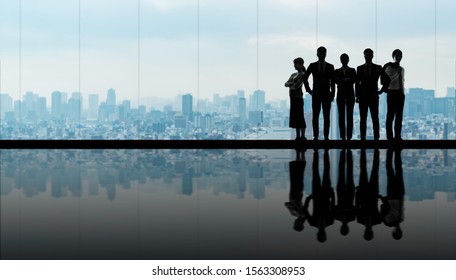 Group of businessperson in front of the city.