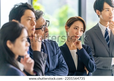 Group of businessperson thinking in the office.