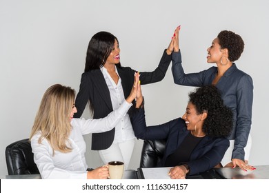 Group of businesswomen working together in an office