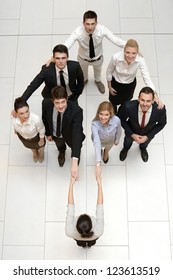 Group Of Bussines People Forming Arow Shape