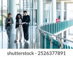 Group of Busy Businessman and businesswoman colleague partnership meeting discussion business project outside office building. Business people startup teamwork working corporate business in the city.