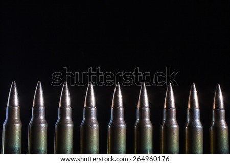 Group of cartridges with steel inserts in the bullets