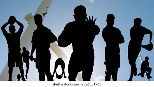 Group of Caucasian rugby players posing dramatically against sky. Wearing sports gear, showcasing strength and teamwork, they are exuding confidence - Powered by Shutterstock