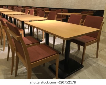 Group of chair and table, set up and prepare for dinner in restaurant.