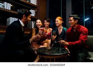 Group of Cheerful People toasting champagne glass celebrating holiday event party together at luxury restaurant bar. Happy man and woman friends enjoy and fun hangout meeting nightlife at nightclub. - Powered by Shutterstock