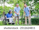 group of cheerful senior people with rehabilitation equipment enjoy talking together in the garden,happy older adult with friends in nature,concept of elderly lifestyle,aging society,family,friendship