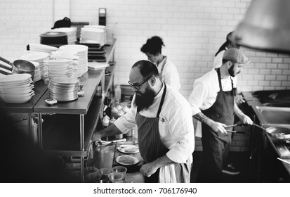 Group of chefs working in the kitchen