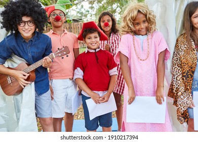 Group Of Children In Carnival Costume Or At Talent Show In The Summer Camp