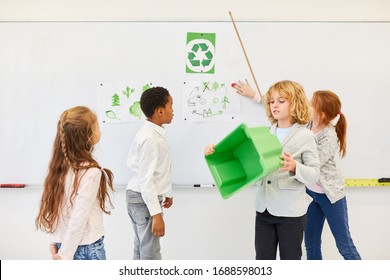 Group of children in elementary school gives a lecture on environmental protection and recycling in the classroom - Powered by Shutterstock