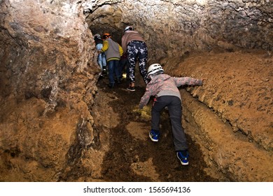  Group Of Children Goes Through A Lava Cave For An Excursion, Tenerife, Education