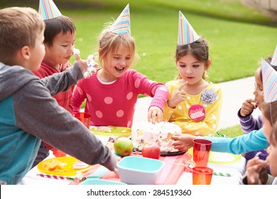 Group Of Children Having Outdoor Birthday Party