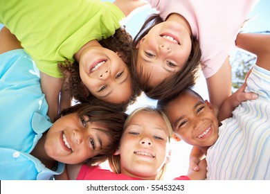 Group Of Children Looking Down Into Camera