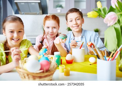 Group Of Children Painting Easter Eggs