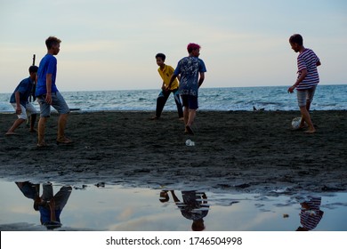 A Group Of Children Play Ball Around Sigandu Beach, Batang Regency. Batang Regency, Central Java, Indonesia. May 31, 2020.