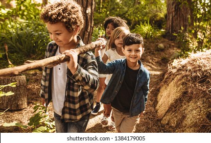 Young Children Playing Nature Stock Photos & Vectors |