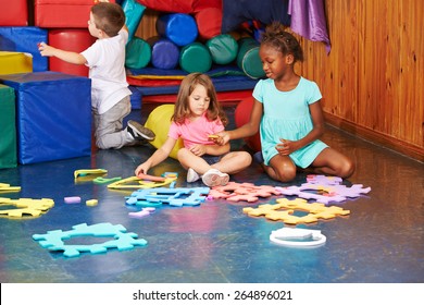 Group of children playing together in a kindergarten