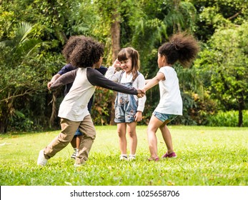 Group of children playing together in the park