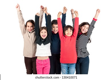 Group of children posing isolated in white
