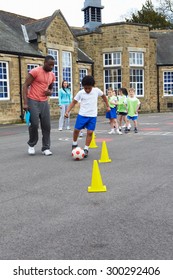 Group Of Children In School Physical Education Class