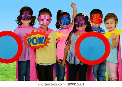 Group of children who are dressed up as superheroes - Powered by Shutterstock