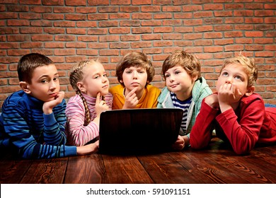 Group Of Children Working Together On Computer. Educational Concept. 