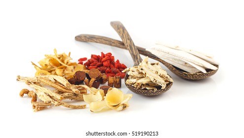 Group Of Chinese Medicine Herbs, Oriental Healthy Ingredients On Wooden Spoon On White Background.