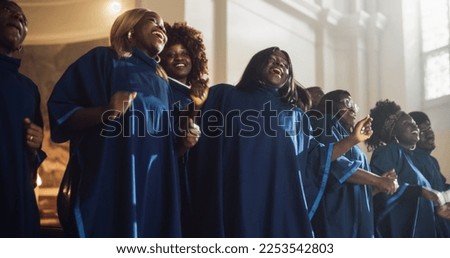 Group Of Christian Gospel Singers Praising Lord Jesus Christ. Song Spreads Blessing, Harmony in Joy and Faith. Church is Filled with Spiritual Message Uplifting Hearts. Music Brings Peace, Hope, Love
