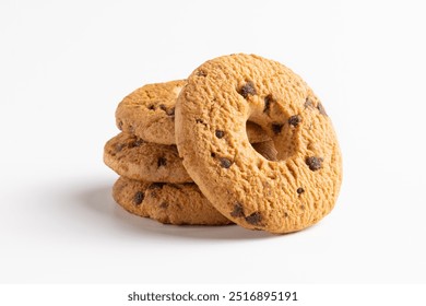 Group of classic shortbread biscuits with chocolate chips, circular biscuits with a hole in the center, typically crumbly and slightly golden on the surface, made with simple ingredients like flour, b - Powered by Shutterstock