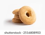 Group of classic shortbread biscuits. Circular biscuits with a hole in the center, typically crumbly and slightly golden on the surface, made with simple ingredients like flour, butter, and sugar