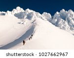 A Group of Climbers Ascends the Hogsback Towards the Pearly Gates on Mt Hood. 

Mt Hood National Forest, Oregon