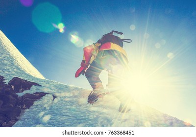 Group Of Climbers Reaches The Top Of Mountain Peak. Climbing And Mountaineering Sport. Nepal Mountains.