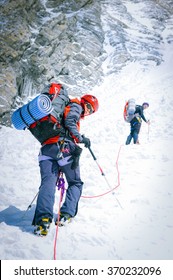 Group Of Climbers Reaching The Summit. Nepal