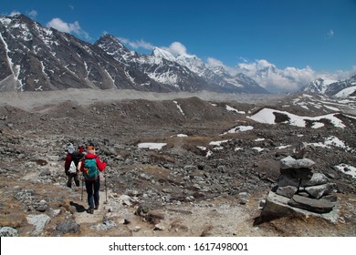 Group Of Climbers In Snow Mountains. Team Work Concept. Sagarmatha National Park, Trek To Everest Base Camp - Nepal Himalayas.