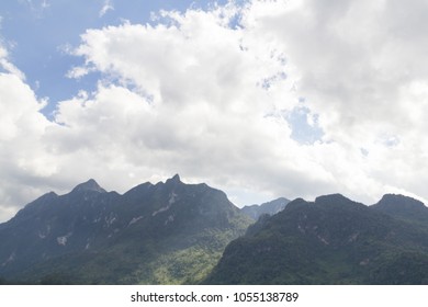 A group of clouds over the mountain