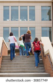 Group Of College Girls Going To School