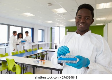 Group Of College Students In Science Class With Experiment