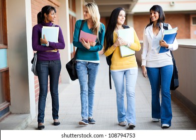 Group Of College Students Walking To Lecture Hall