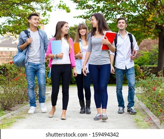 Group Of College Students Walking Together