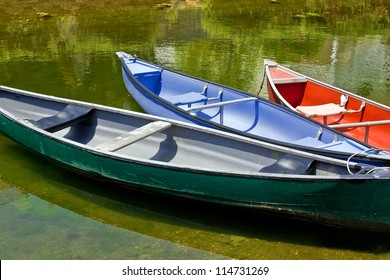 Group of colorful canoes in a river