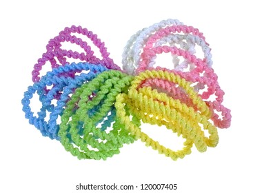 A Group Of Colorful Elasticized Pony Tail Holders.