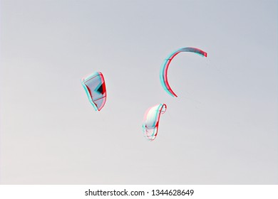 Group Of Colorful Kites Of Kiteboarding Flying In Sky By The Wind Blow With Glitch Effect. Active Pastime And Summer Sports Concept