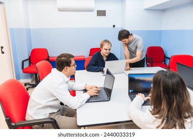 Group computer class with a focus on Down syndrome inclusion.