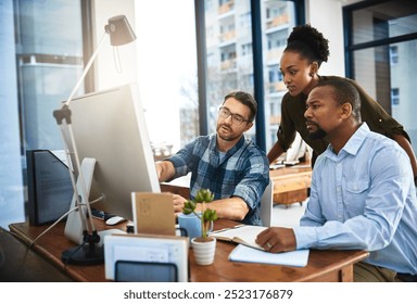 Group, computer and discussion for project, office and intern with lead graphic designer, review and feedback. Teamwork, planning and criticism for assignment, creative and people in design agency - Powered by Shutterstock