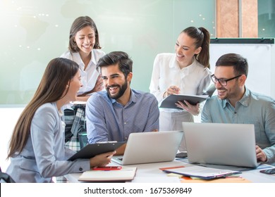 Group Of Confidence Business People Working Together In The Office.