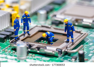 Group of construction workers repairing CPU. Technology concept
