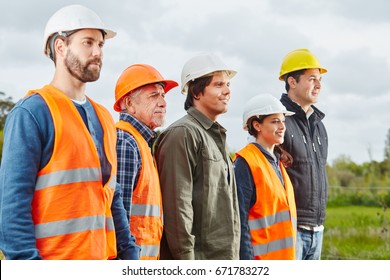 Group Of Construction Workers Standing Proud And Self Confident